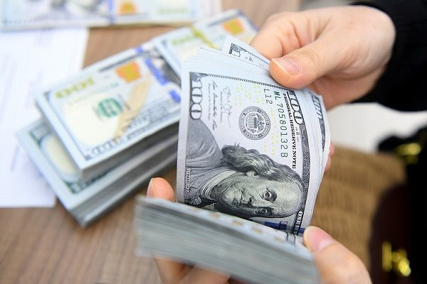 Tỷ giá USD ngày 8/1: Tỷ giá trung tâm tiếp tục giảm nhẹ- Ảnh 1.