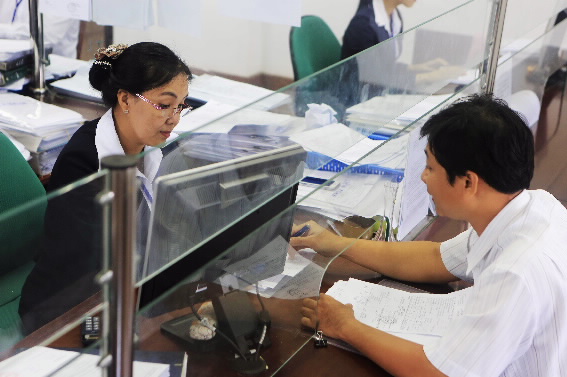 Kho bạc Nhà nước: Bảo đảm hoàn thành công tác chi trả chế độ theo Nghị định 178 trước ngày 15/10- Ảnh 1.