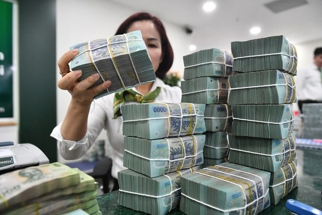 Tiền gửi dân cư tiếp tục chảy thêm vào hệ thống ngân hàng- Ảnh 1. Tiền gửi dân cư tiếp tục chảy thêm vào hệ thống ngân hàng- Ảnh 1.