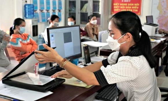 Từ 1/7, người đi công chứng phải chụp ảnh tại thời điểm ký văn bản- Ảnh 1. Từ 1/7, người đi công chứng phải chụp ảnh tại thời điểm ký văn bản- Ảnh 1.