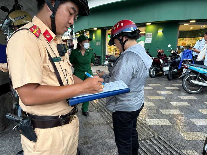 CSGT tăng cường xử phạt lỗi giao thông mà nhiều người đi xe máy mắc phải: 14 triệu người dân chú ý!- Ảnh 2.