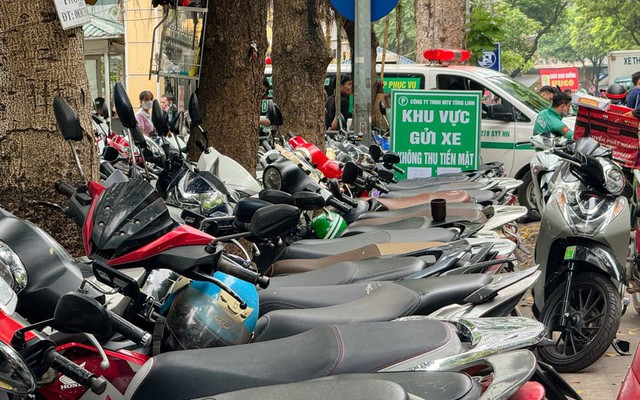 Hà Nội đặt mục tiêu 100% điểm trông giữ ô tô thu phí không dừng - Ảnh 1.