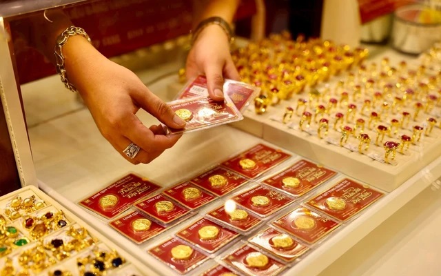 Giá vàng hôm nay 13/2: Giá vàng thế giới giảm xuống đáy một tuần- Ảnh 1.