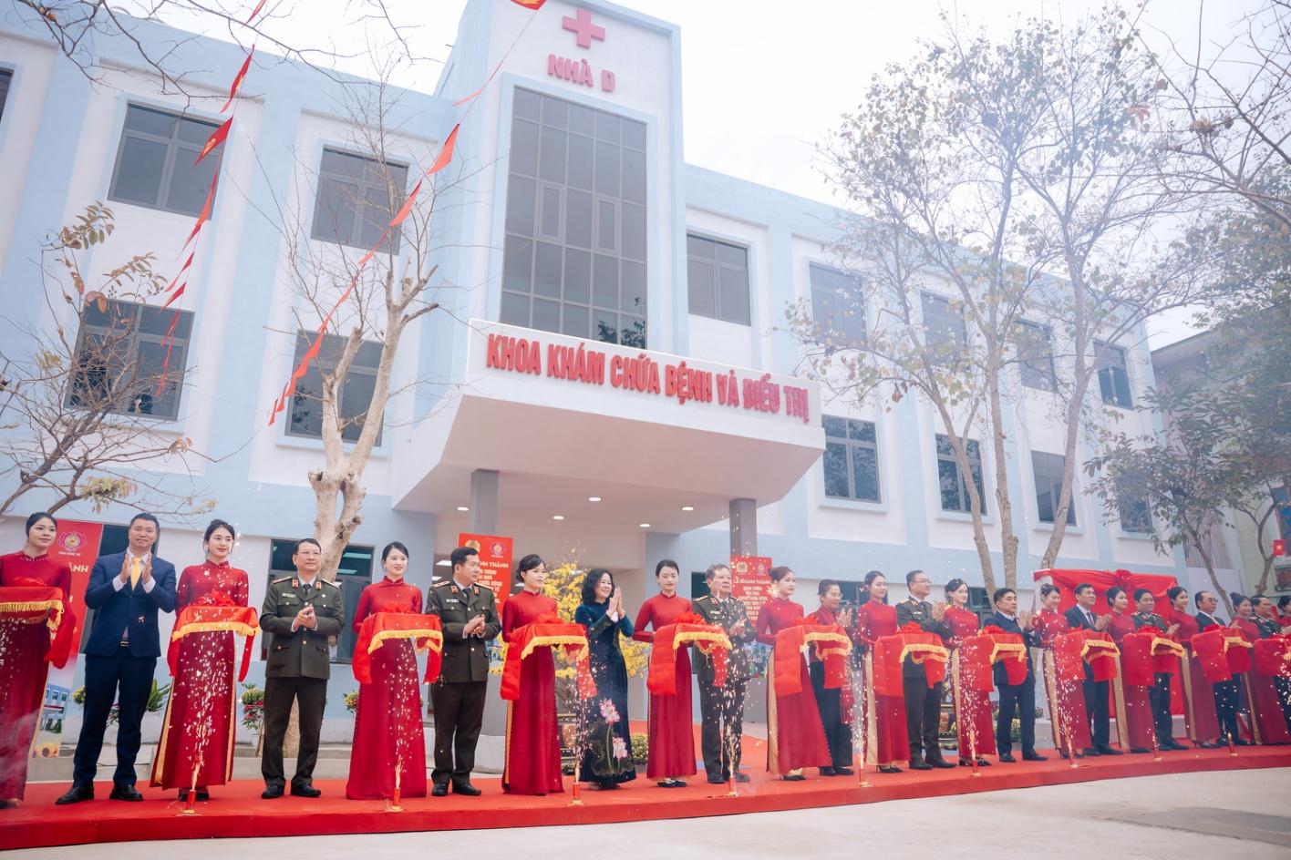 A group of people standing in front of a building  AI-generated content may be incorrect.