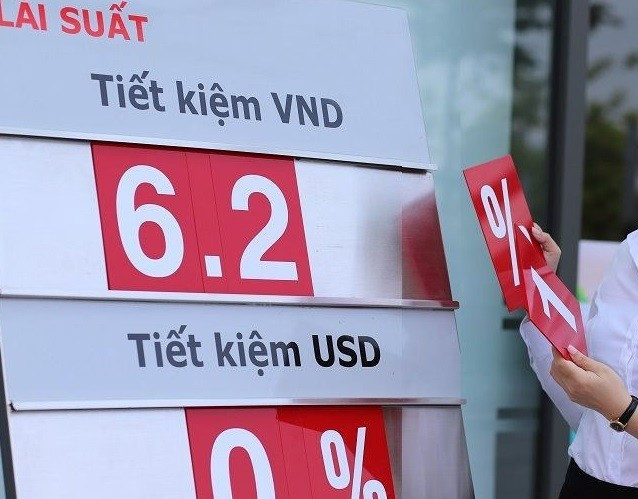 17 ngân hàng đồng loạt giảm lãi suất huy động- Ảnh 1.