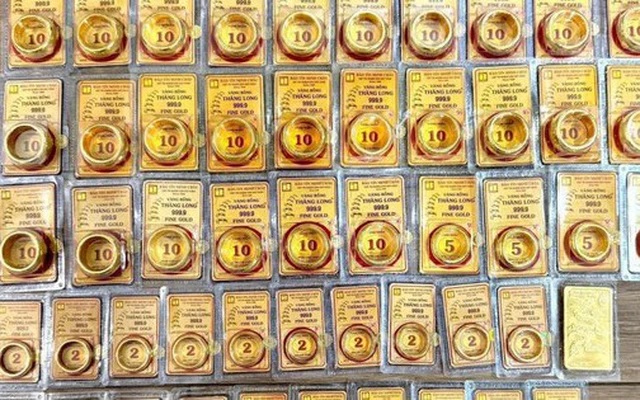 Giá vàng hôm nay 24/4: Vàng thế giới lại hạ nhiệt khi đồng USD phục hồi- Ảnh 1.