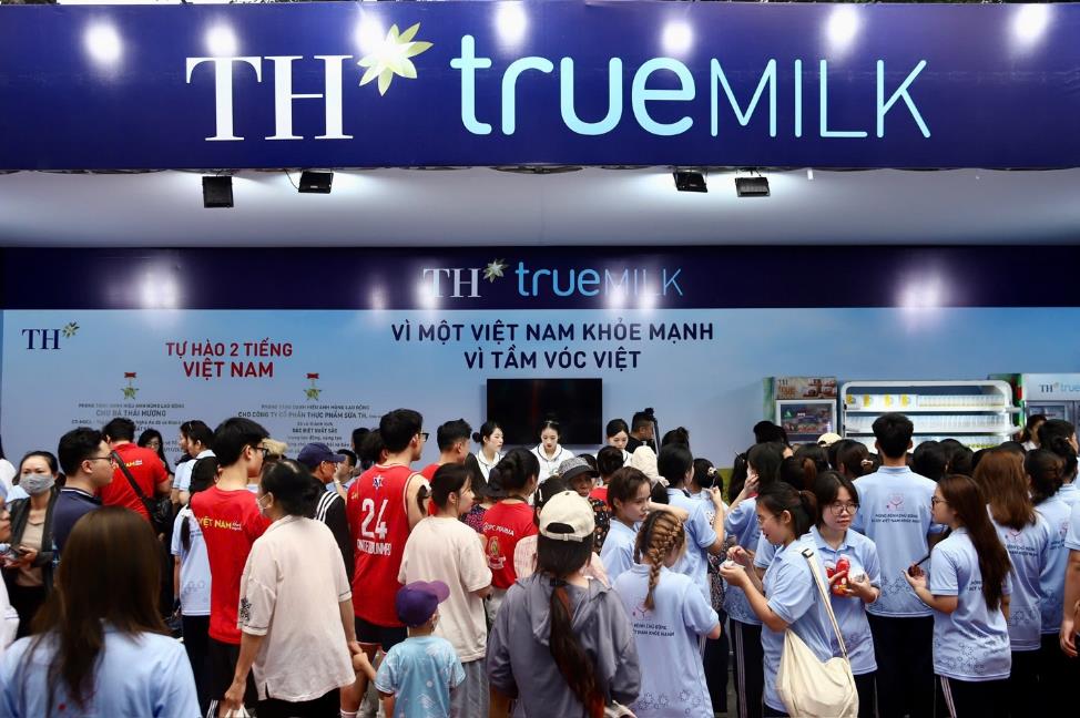 A group of people standing in front of a sign  AI-generated content may be incorrect.