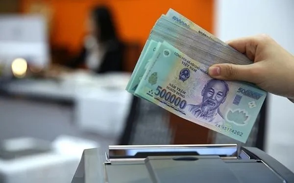 Lượng tiền mặt lưu thông trong nền kinh tế giảm tháng thứ 3 liên tiếp- Ảnh 1.