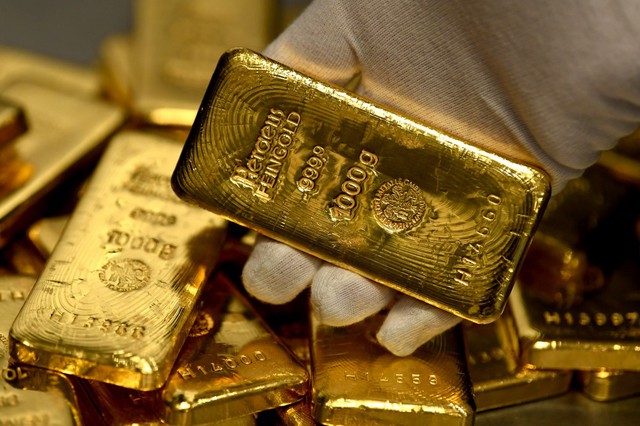 Giá vàng hôm nay 11/3: USD suy yếu, vàng tăng nhẹ trở lại - Ảnh 1.