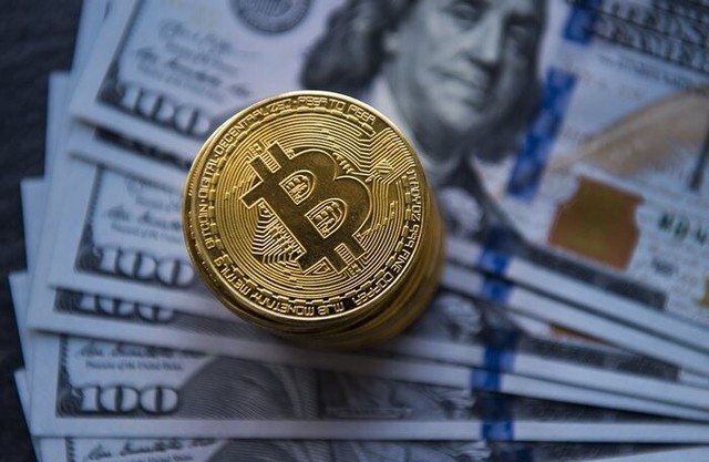 Giá Bitcoin hôm nay 12/3: Tăng mạnh về vùng 58.000 USD - Ảnh 1.