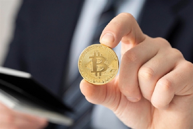 Giá Bitcoin hôm nay 19/3: Dao động trong khu vực 57.000 - 60.000 USD - Ảnh 1.