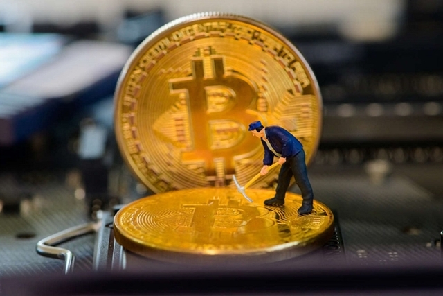 Giá Bitcoin hôm nay 8/3: 'Xuyên phá' thành công mốc 50.000 USD - Ảnh 1.