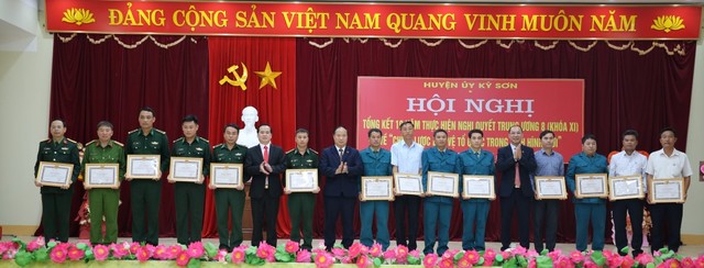 Nghệ An- Huyện Kỳ Sơn: Tổng kết 10 năm thực hiện Nghị quyết Trung ương 8 khóa XI về Chiến lược bảo vệ Tổ quốc  - Ảnh 7.