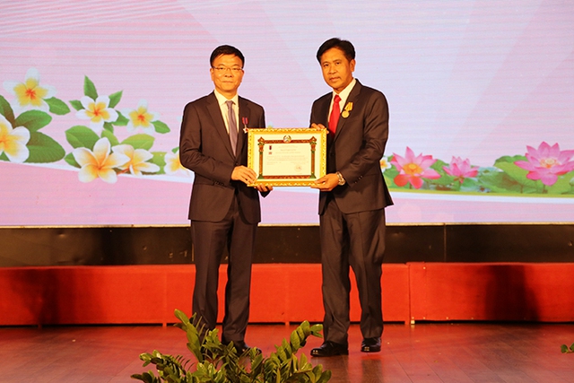 Kỷ niệm 40 năm quan hệ hợp tác pháp luật và tư pháp giữa Bộ Tư pháp Việt Nam và Bộ Tư pháp Lào - Ảnh 6.