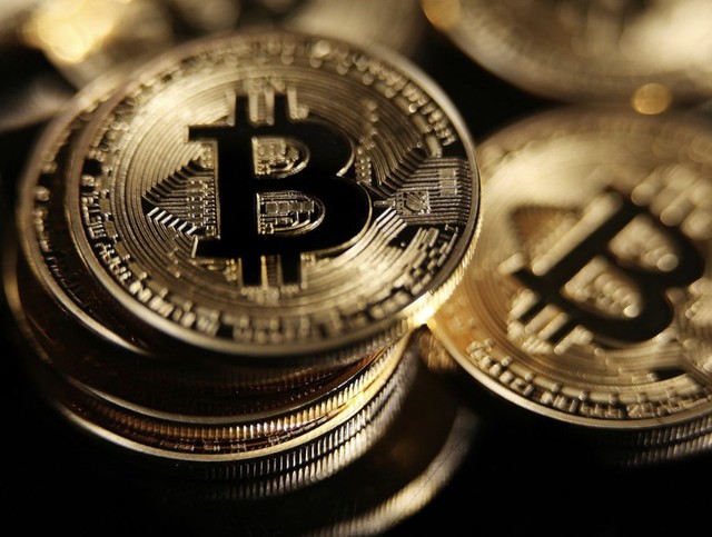 Giá Bitcoin hôm nay 18/10: Biến động trước thông tin giả - Ảnh 1.
