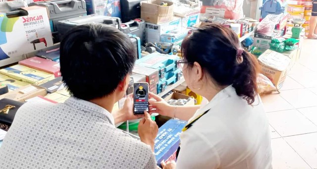 Ngành Thuế tỉnh Nghệ An: Đẩy mạnh triển khai ứng dụng eTax Mobile. - Ảnh 3.