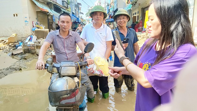 Công ty Trường Hưng đưa những thông điệp yêu thương đến vùng đồng bào bị dịch bệnh, bão lũ.- Ảnh 7.