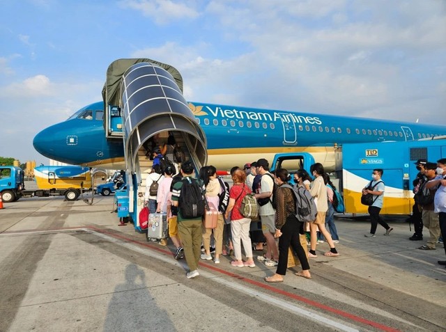 Vietnam Airlines Group tăng 650.000 ghế dịp Tết Nguyên đán Ất Tỵ 2025- Ảnh 1.