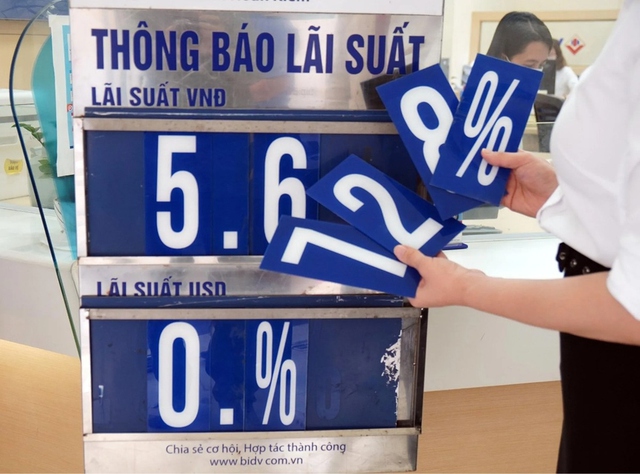 Hạ lãi suất cho vay: Cơ hội hay sức ép của ngành ngân hàng?- Ảnh 1.