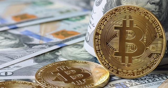 Giá Bitcoin hôm nay 9/4: Khó giảm về 50.000 USD- Ảnh 1.