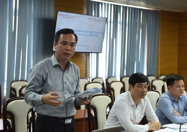 BHXH TP Hà Nội và tỉnh Khánh Hòa trao đổi kinh nghiệm trong việc thực hiện Đề án 06/CP- Ảnh 2.