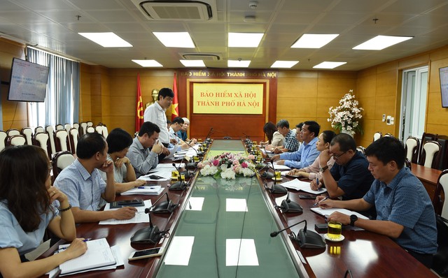 BHXH TP Hà Nội và tỉnh Khánh Hòa trao đổi kinh nghiệm trong việc thực hiện Đề án 06/CP- Ảnh 1.