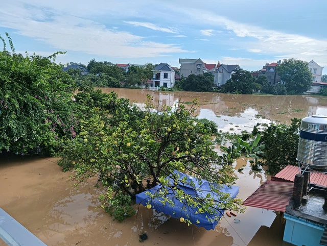 Bắc Ninh hỗ trợ 20 tỉ đồng cho 17 xã, phường vùng lũ lụt- Ảnh 1.