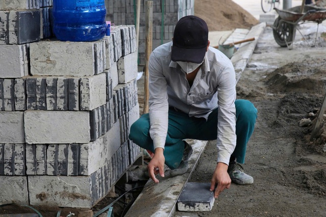 Hà Nội làm mới vỉa hè trên nhiều tuyến phố- Ảnh 7.