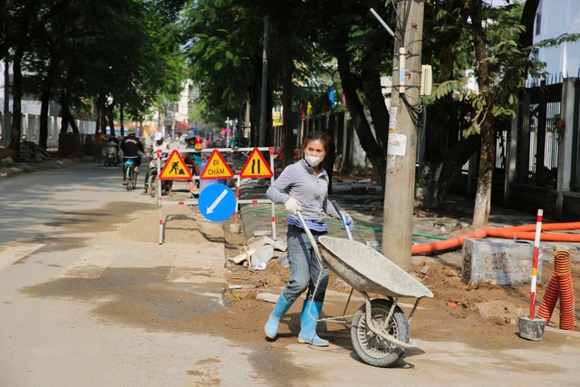 Hà Nội làm mới vỉa hè trên nhiều tuyến phố- Ảnh 9.