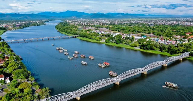 Huế – Hình mẫu thành phố sống xanh giữa làn sóng đô thị hóa- Ảnh 1. Huế – Hình mẫu thành phố sống xanh giữa làn sóng đô thị hóa- Ảnh 1.