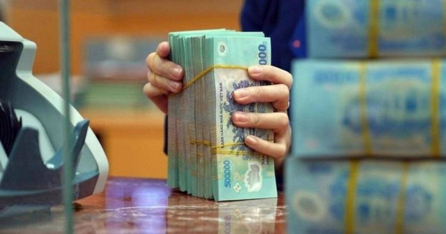 Nhiều doanh nghiệp gửi tiền 'nhàn rỗi' tại ngân hàng- Ảnh 1. Nhiều doanh nghiệp gửi tiền 'nhàn rỗi' tại ngân hàng- Ảnh 1.