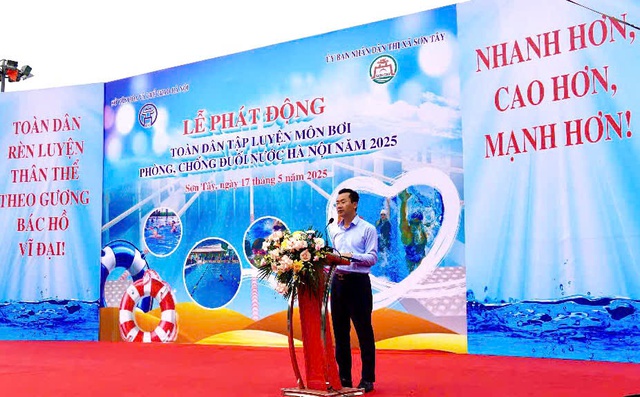 Hà Nội: Gần 2.000 người dự phát động toàn dân tập bơi, phòng, chống đuối nước- Ảnh 2. Hà Nội: Gần 2.000 người dự phát động toàn dân tập bơi, phòng, chống đuối nước- Ảnh 2.