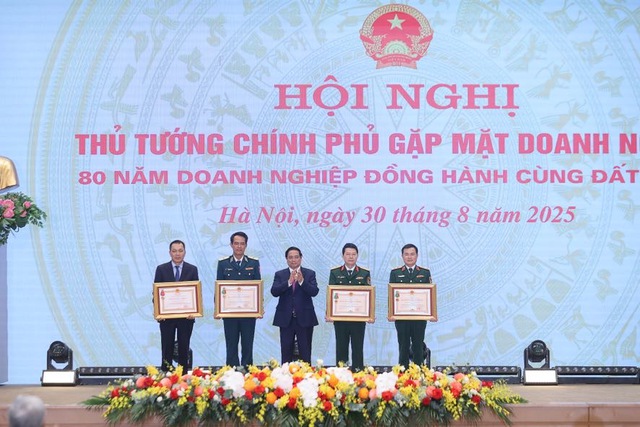 Gặp Thủ tướng, doanh nghiệp có lãi gần 2 tỷ USD lập kỷ lục Việt Nam được trao huân chương gì?- Ảnh 1. Gặp Thủ tướng, doanh nghiệp có lãi gần 2 tỷ USD lập kỷ lục Việt Nam được trao huân chương gì?- Ảnh 1.