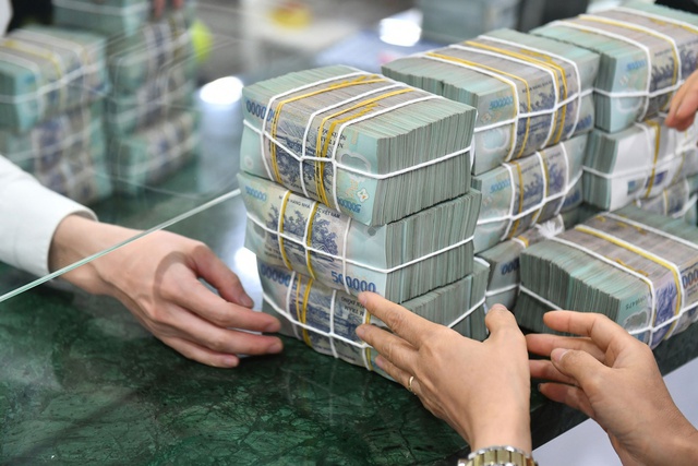 Dự báo tăng trưởng tín dụng trong năm 2025 có khả năng tiếp cận mức 18 - 20%- Ảnh 1.