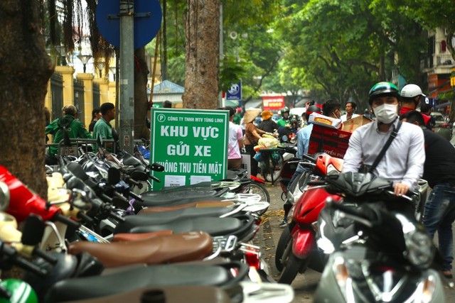 Hà Nội chấn chỉnh vi phạm trong hoạt động trông giữ phương tiện giao thông- Ảnh 1. Hà Nội chấn chỉnh vi phạm trong hoạt động trông giữ phương tiện giao thông- Ảnh 1.