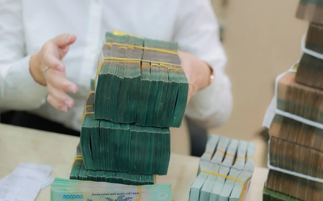 Hà Nội: Hoạt động tín dụng ngân hàng đáp ứng nhu cầu vốn cho doanh nghiệp, người dân- Ảnh 1.