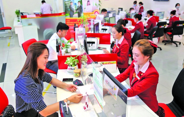 Triển vọng kinh doanh ngành ngân hàng năm 2026 sẽ thận trọng hơn dự báo- Ảnh 1.