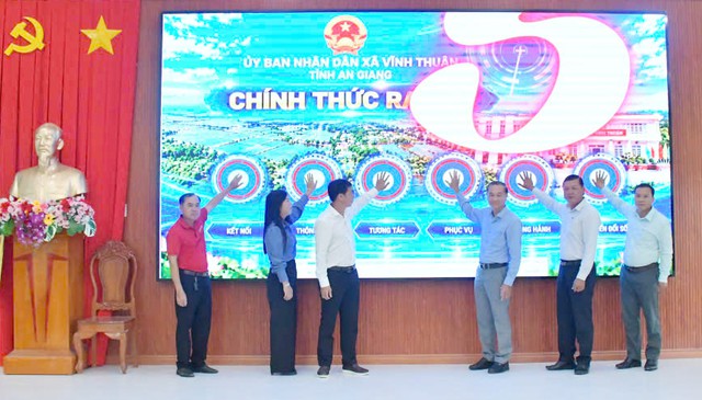 Agribank Vĩnh Thuận Kiên Giang II đồng hành cùng xã Vĩnh Thuận lan toả thanh toán số tại chợ Đập Đá- Ảnh 1.