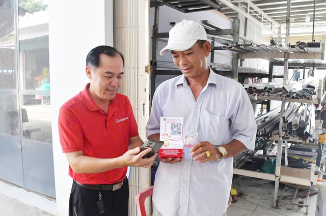 Agribank Vĩnh Thuận Kiên Giang II đồng hành cùng xã Vĩnh Thuận lan toả thanh toán số tại chợ Đập Đá- Ảnh 6.