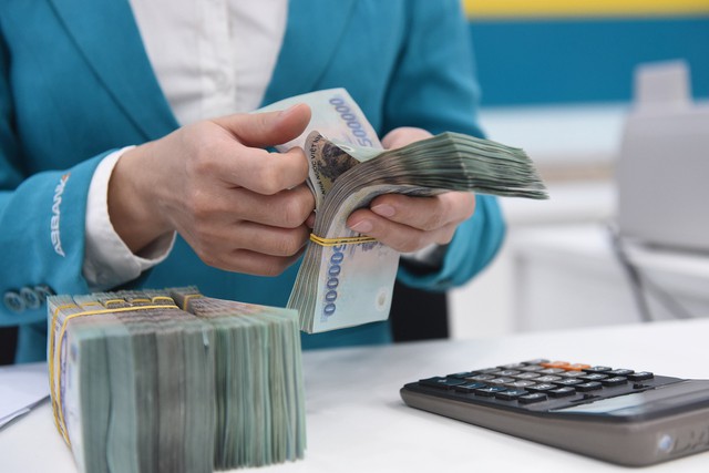 NHNN yêu cầu ngân hàng giảm lãi suất huy động 0,5% và cho vay 1,5 - 2%/năm- Ảnh 1.