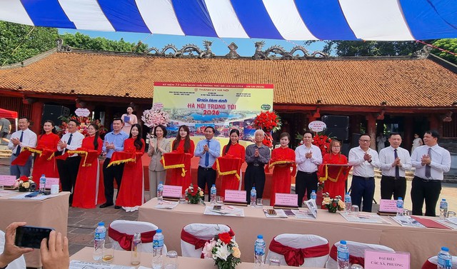 Thưởng lãm những góc nhìn độc đáo về chính quyền địa phương hai cấp của Thủ đô qua ống kính - Ảnh 1.