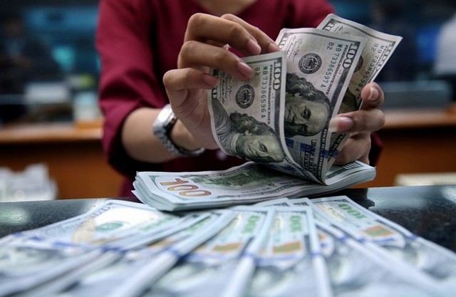 VND tăng giá 1,12% so với USD - Ảnh 1.