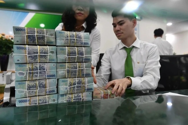 Các nhà băng bước vào cuộc đua hút tiền gửi đầy sôi động- Ảnh 1.