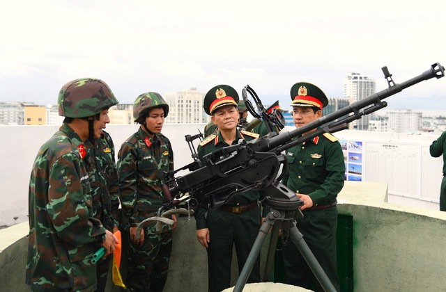 “Màu áo lính” hòa cùng ngày hội non sông- Ảnh 5. “Màu áo lính” hòa cùng ngày hội non sông- Ảnh 5.