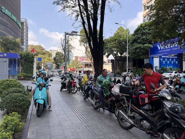 Các hãng xe công nghệ đẩy mạnh hỗ trợ người dùng và tài xế- Ảnh 1.