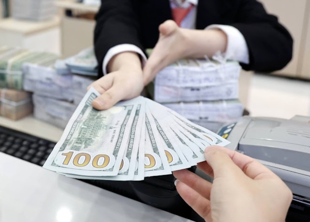 Tỷ giá USD hôm nay 22/5: Tỷ giá trung tâm giảm 1 đồng- Ảnh 1.