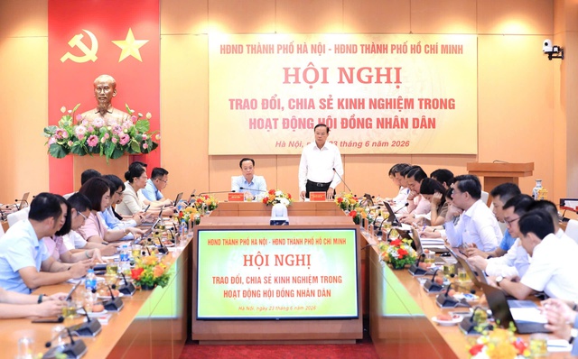 HĐND TP. Hồ Chí Minh và HĐND TP. Hà Nội trao đổi chia sẻ kinh nghiệm chuyển đổi số, ứng dụng AI trong hoạt động cơ quan dân cử; triển khai Luật Thủ đô năm 2026 - Ảnh 1.