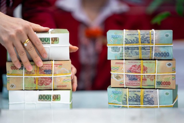 Ngân hàng đồng loạt triển khai 4 chương trình tín dụng quy mô lớn- Ảnh 1.