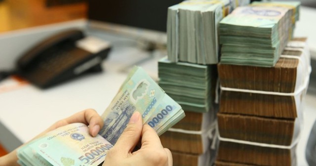 Tiền gửi của người dân tại các tổ chức tín dụng đã vượt mốc 11 triệu tỷ đồng - Ảnh 1.