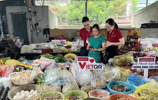 Thanh Hóa: Tăng tốc thanh toán không dùng tiền mặt, mở rộng nền tảng cho kinh tế số - Ảnh 1.